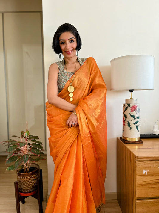 Shimmering Orange and Gold Cotton Zari Saree