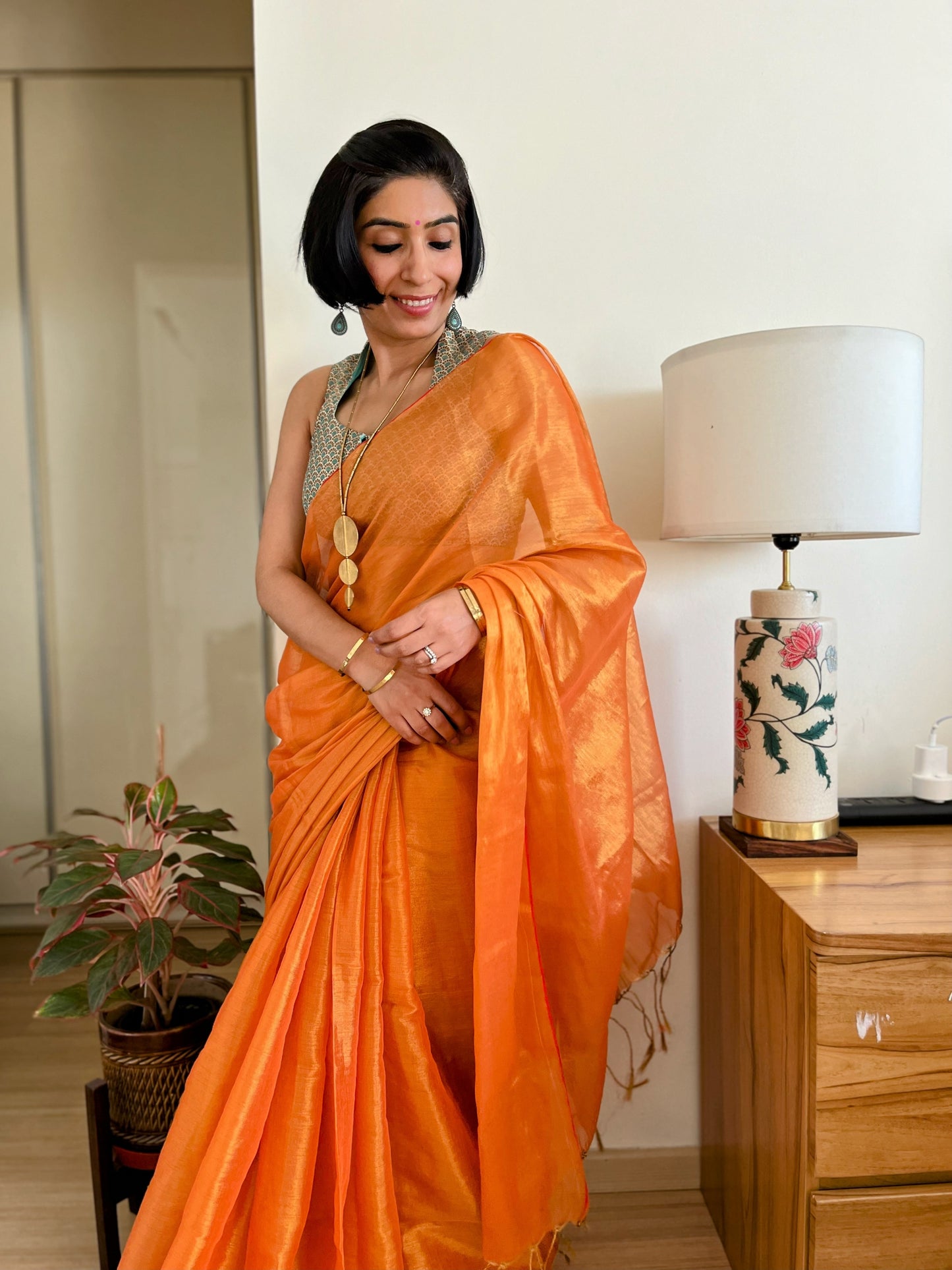 Shimmering Orange and Gold Cotton Zari Saree