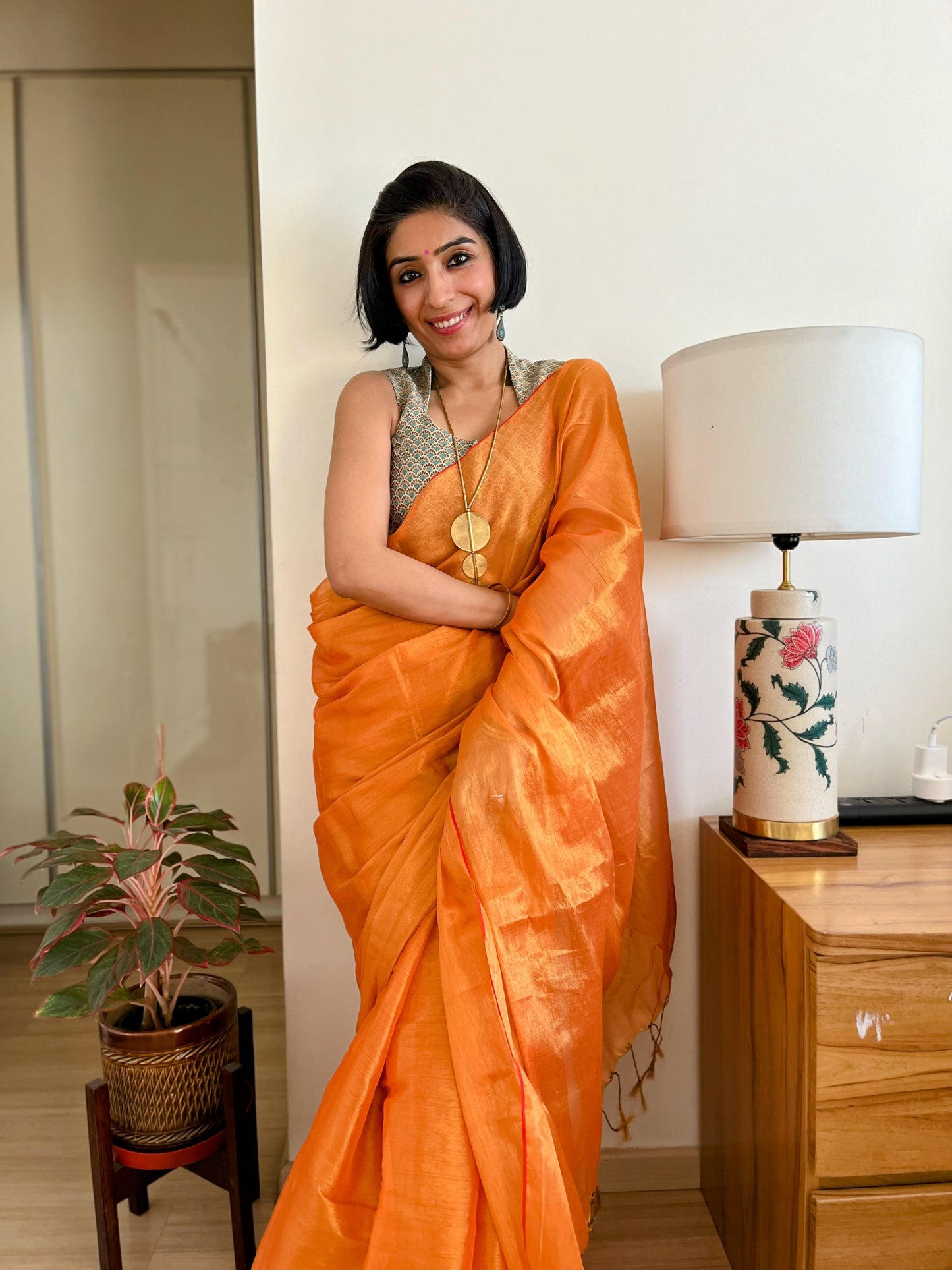 Shimmering Orange and Gold Cotton Zari Saree