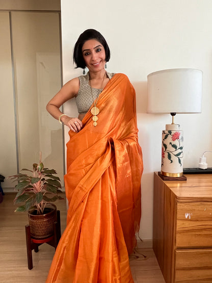 Shimmering Orange and Gold Cotton Zari Saree