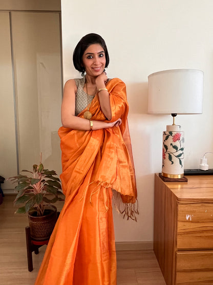 Shimmering Orange and Gold Cotton Zari Saree