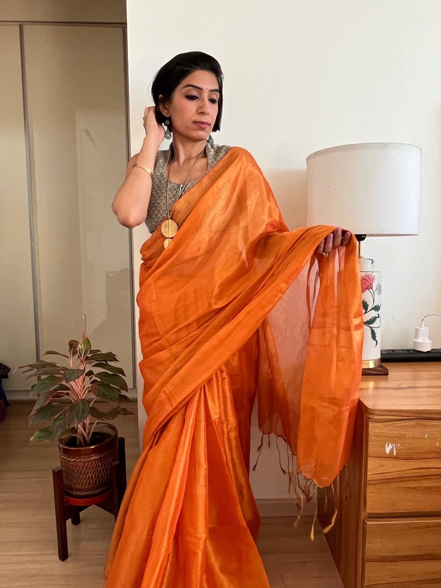Shimmering Orange and Gold Cotton Zari Saree