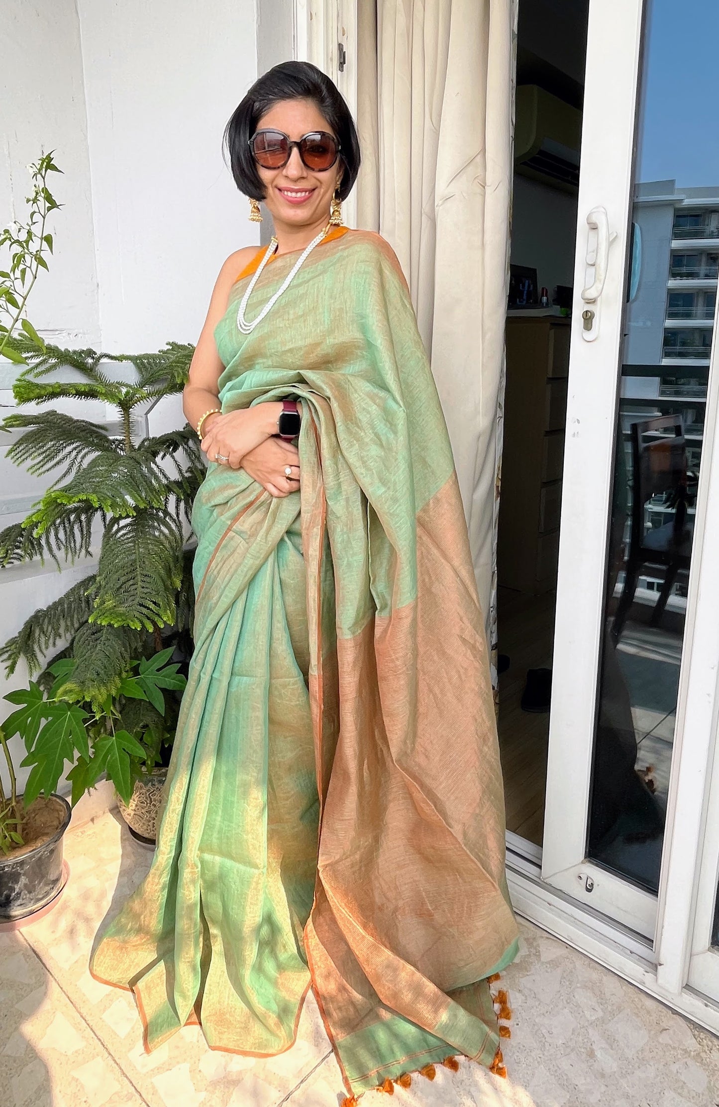 Teal and Bronze Linen Tissue Saree